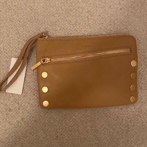 Tan wristlet with strap from Hammit. New with Tags